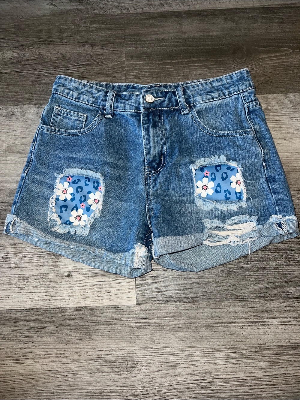 Blue Denim Women's Shorts with Floral Patch Details